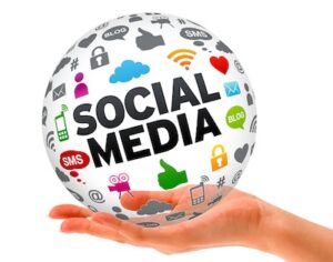 Hand holding a Social Media 3d Sphere sign on white background.